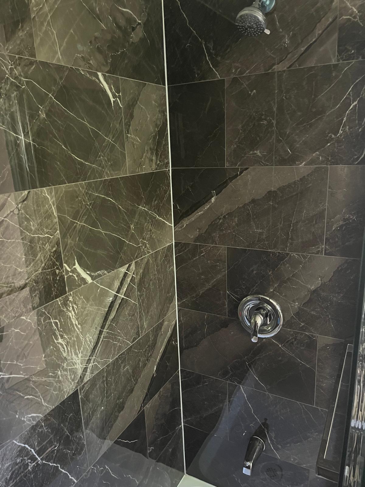 Shower view of a motel room